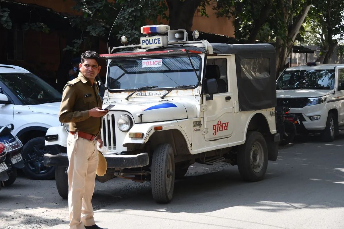 kota university professor stalking case om gunjal