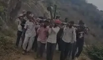 villagers climbed the mountain carrying a distribution transformer dt on their shoulders now utaraz village will be illuminated